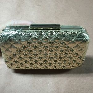MMS gold crossbody/clutch